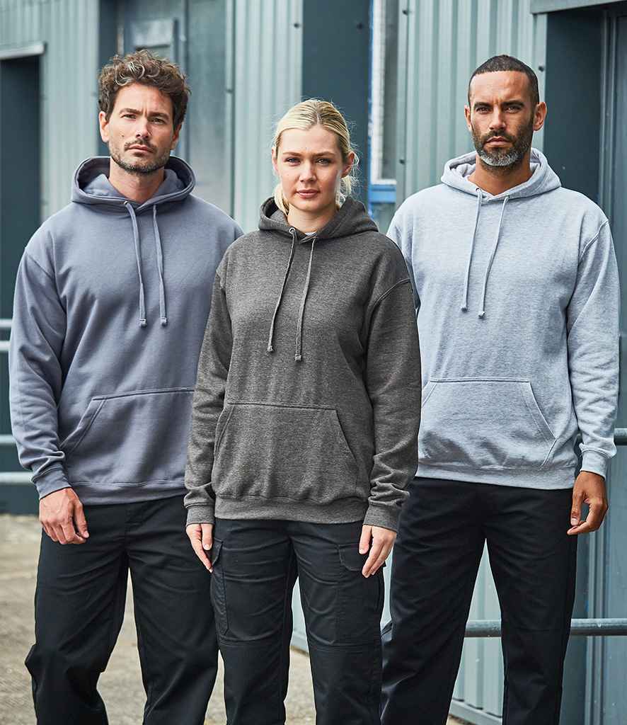 Three people standing outdoors, wearing hoodies in different colors, with a front kangaroo pocket visible on one of the hoodies.
