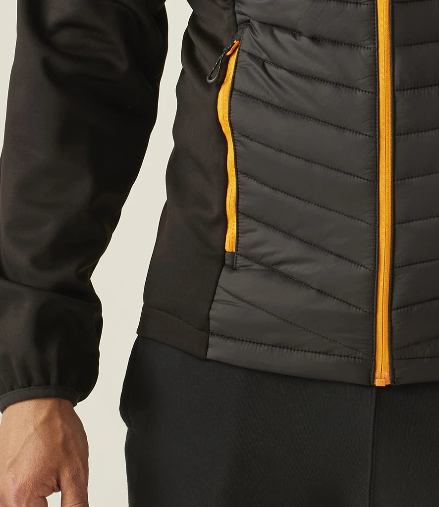 Close-up of orange-trim jacket showing side zip pocket and stretch-bound cuff